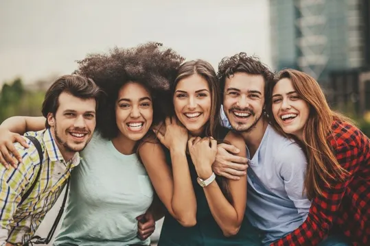 Group of friends laughing together